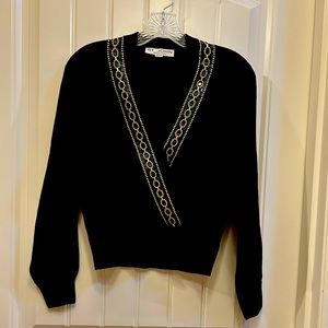 St John black v-neck sweater with gold and black sequin trim, size S.